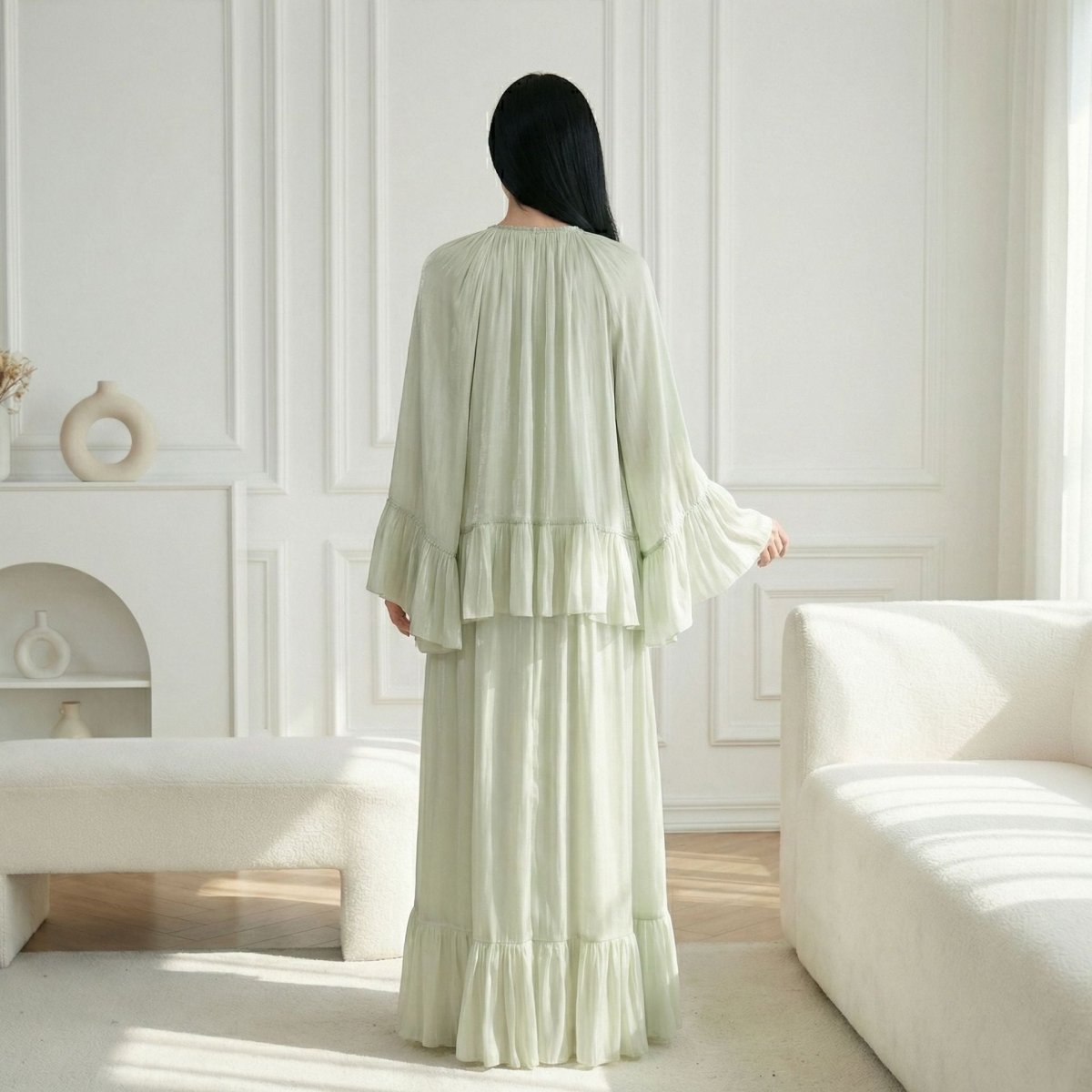 Ruffle hem trim detail on the outer abaya cape