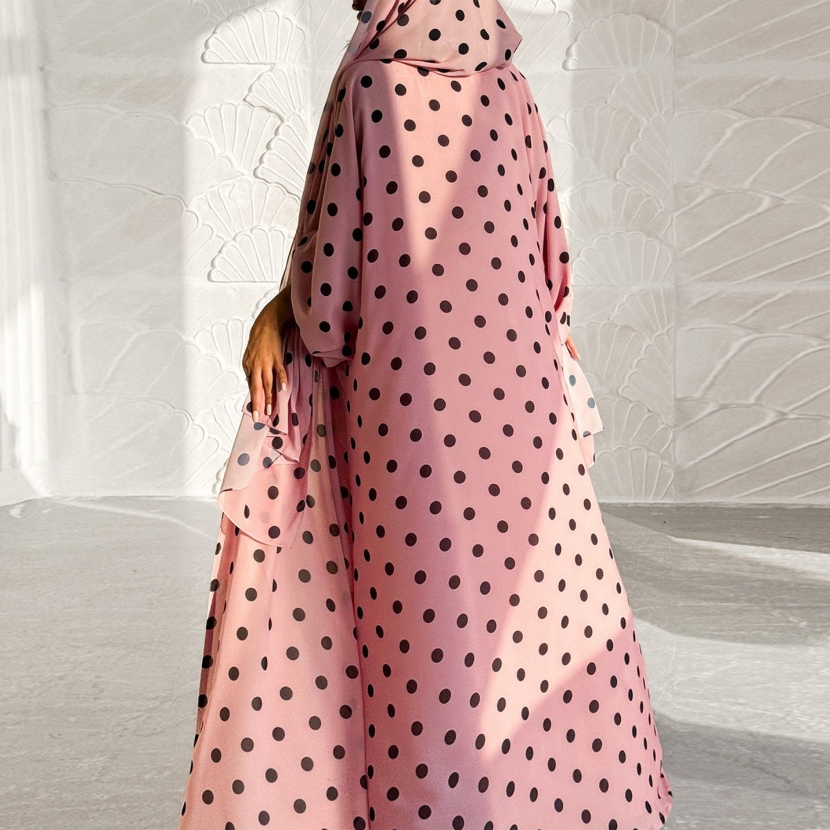 Full-length side view of 2-piece polka dot crepe abaya set