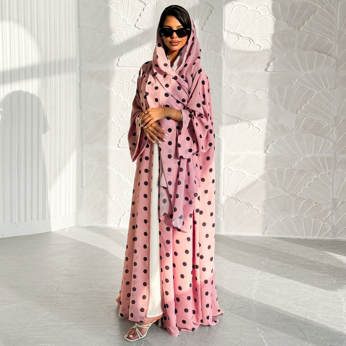 Matching polka dot hijab and abaya set in coordinating colourway