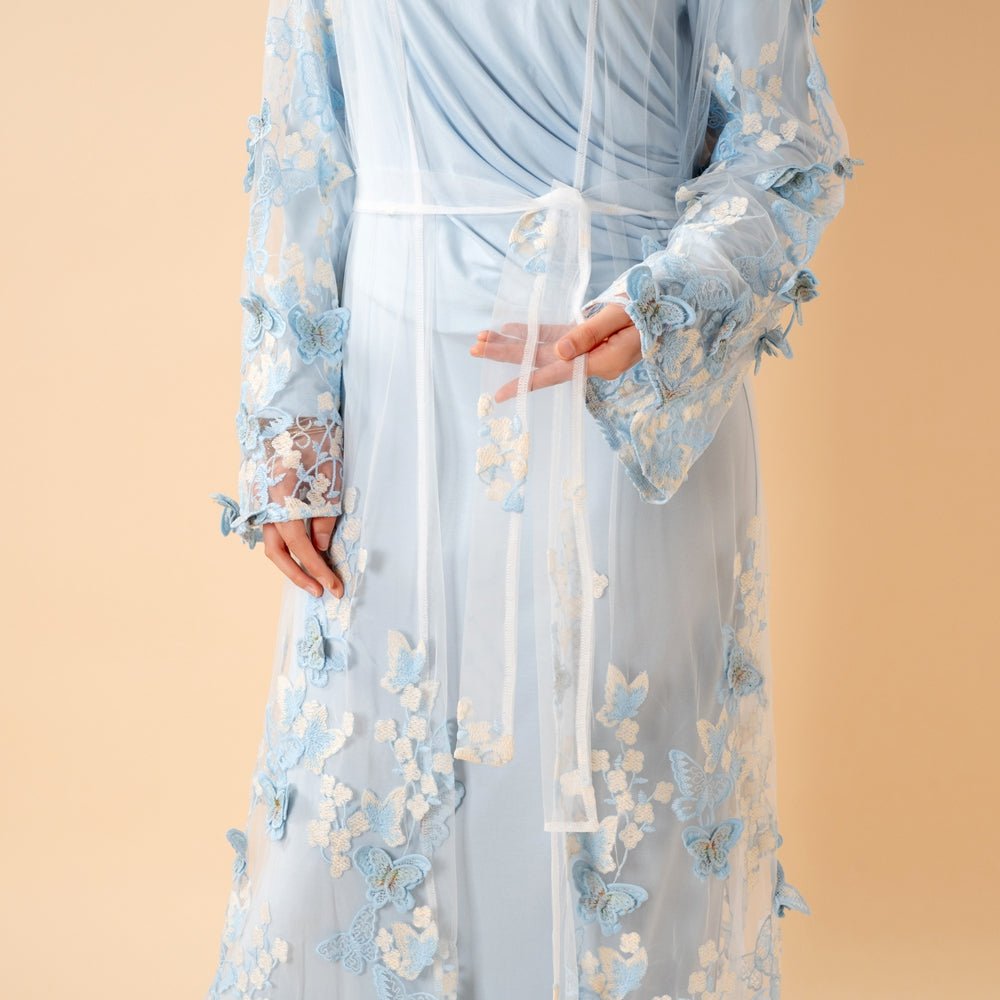 Full-length front view of the Butterfly Whisper open abaya in ice blue and white