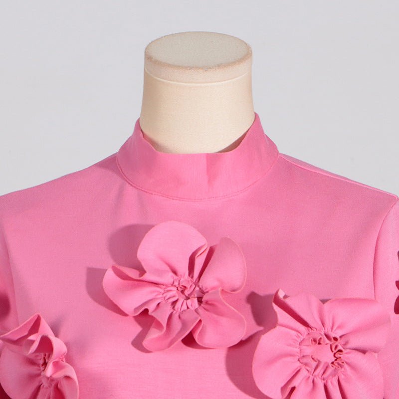 Back view of luxury floral gown with stand collar and tie closure