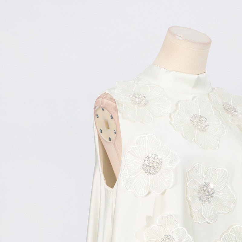 Flowing A-line skirt of the white formal maxi dress