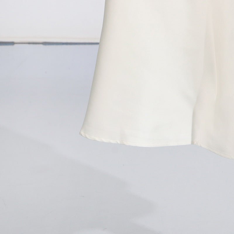 Full-length styled view of the white floral bridal maxi dress