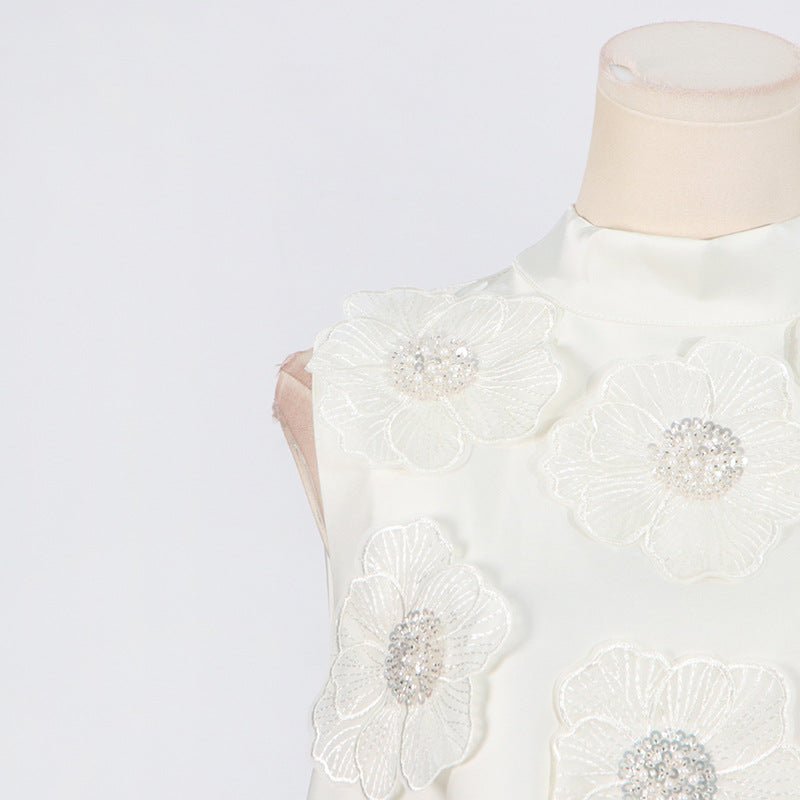 Sleeveless armhole detail of the floral appliqué bridal dress