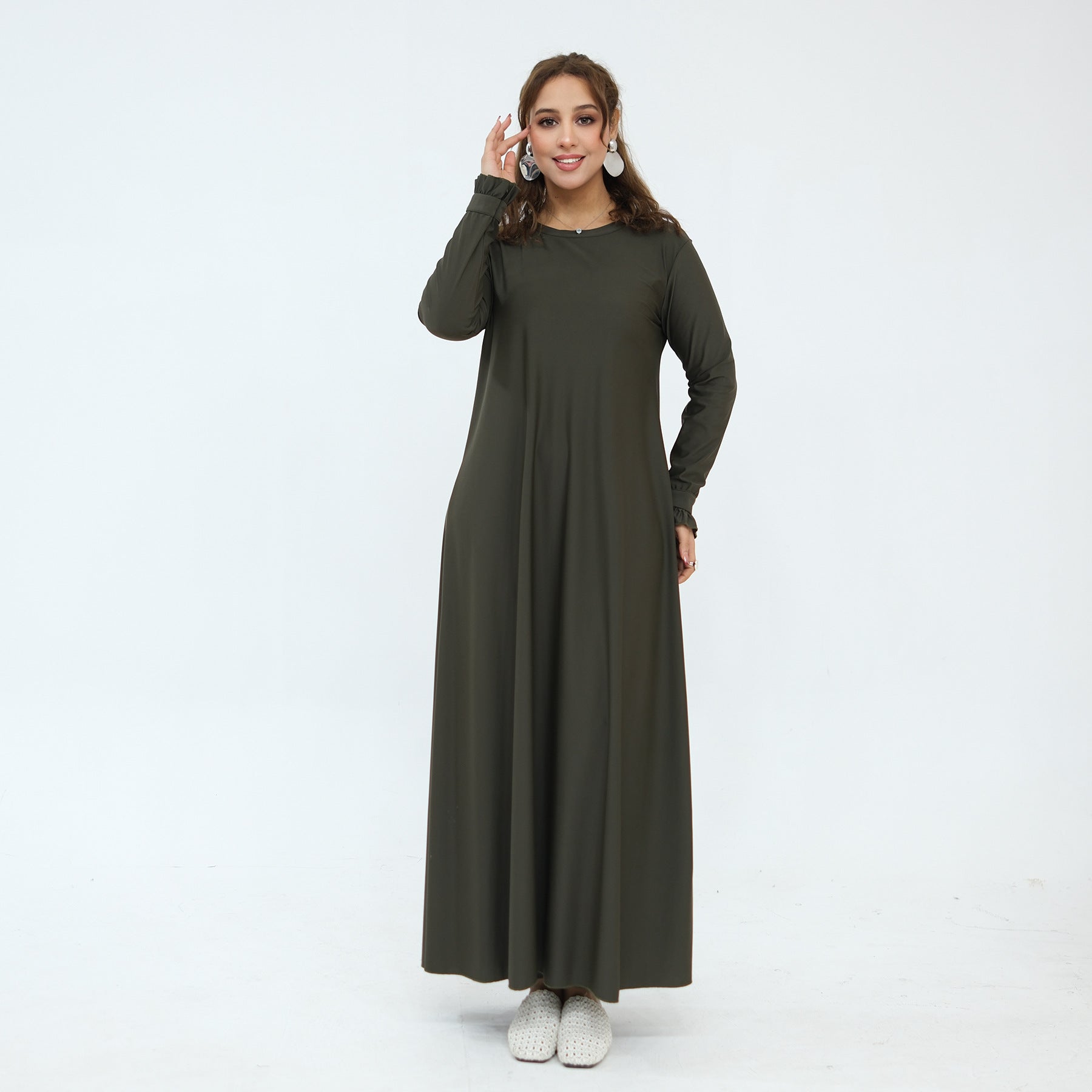 Front view of two-piece modest swimwear set with ruffle cuff sleeves