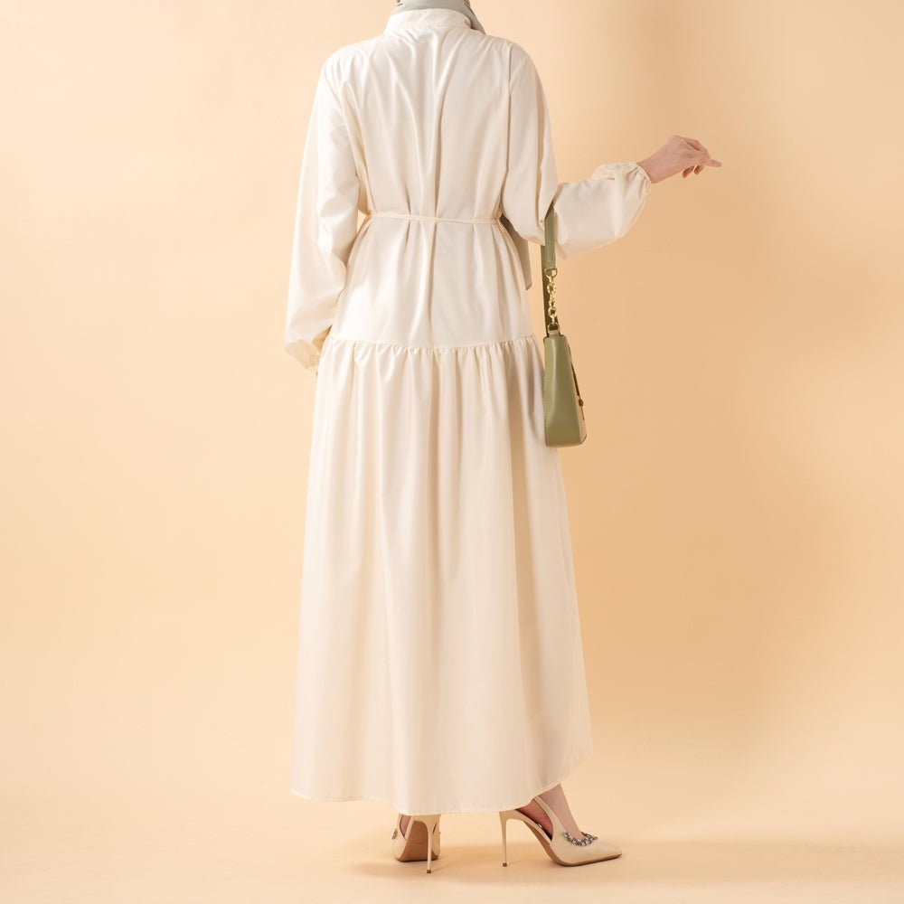 Wrinkle-resistant maxi abaya hanging flat — travel-ready modest dress