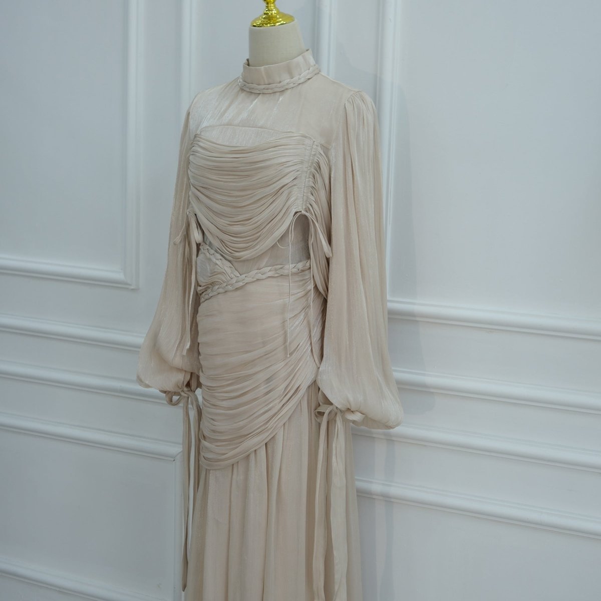 Concealed back zip running cleanly from neckline downward