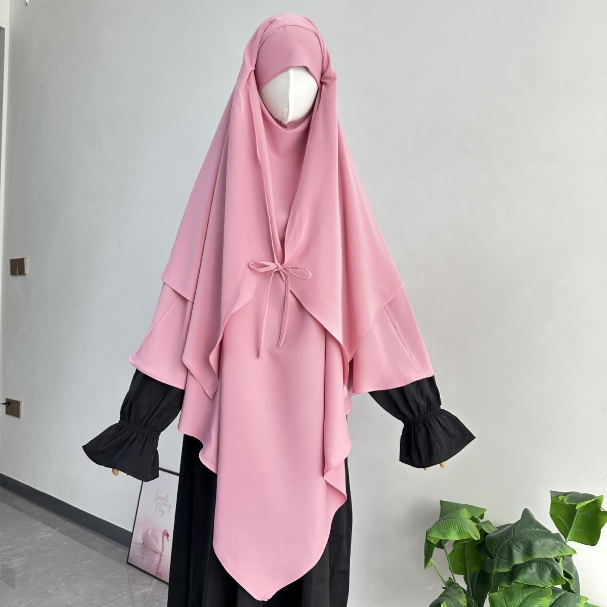 Draped silhouette of tie-front khimar suitable for Salah and daily modest wear