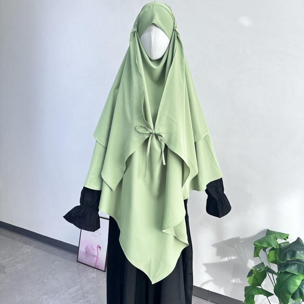 Full-length front view of double layer khimar draped from head to hips
