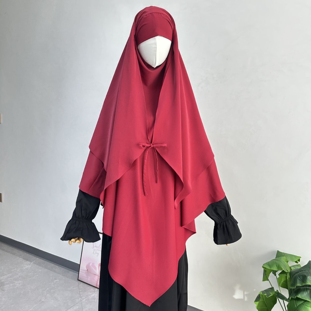 Close-up of nida fabric texture on tie-front khimar