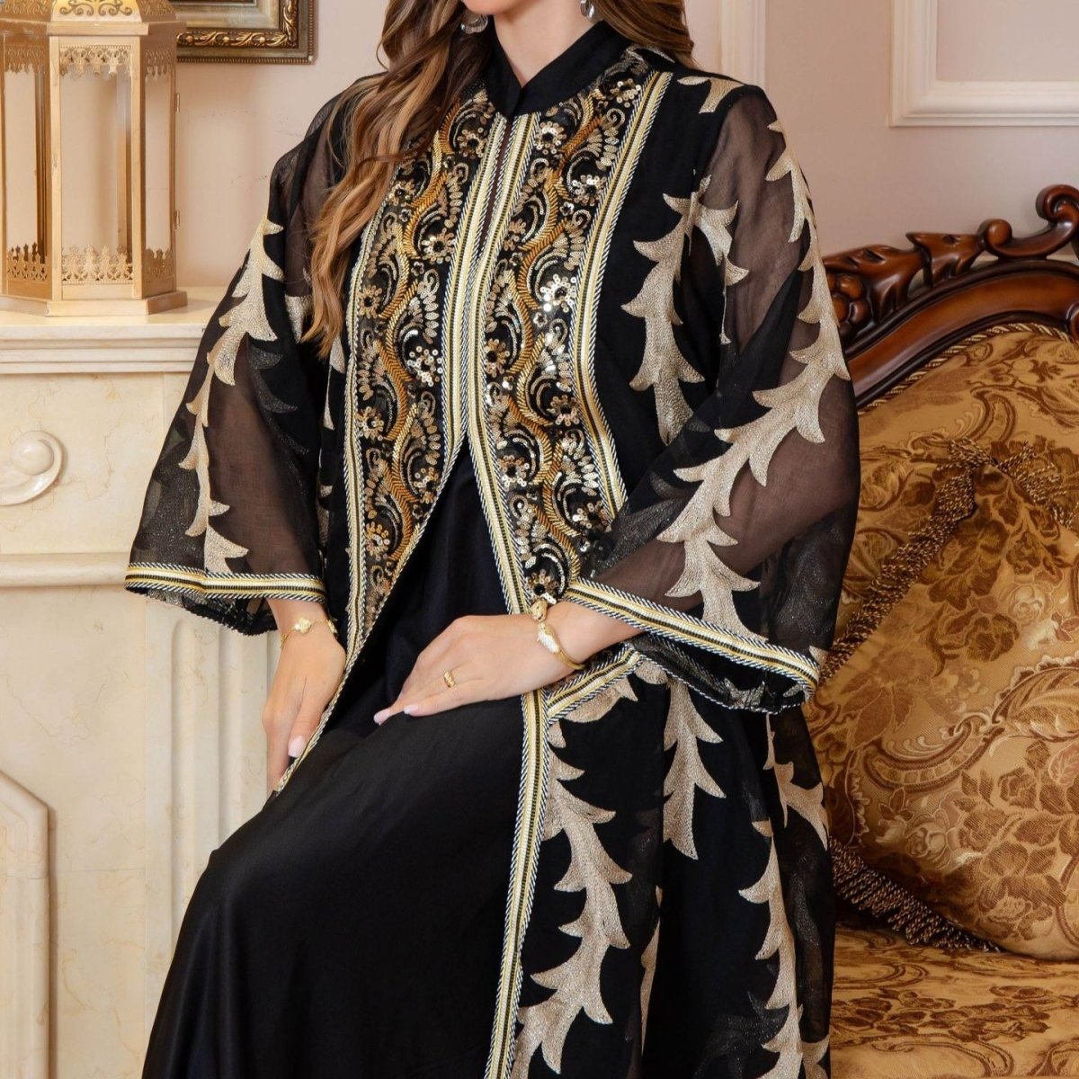 White mesh party abaya with intricate embroidery and modest coverage
