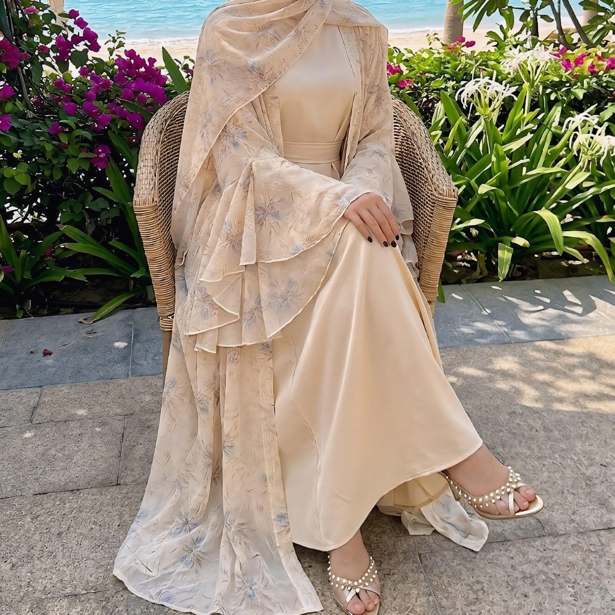 Wide flare sleeve detail on blush floral chiffon open abaya
