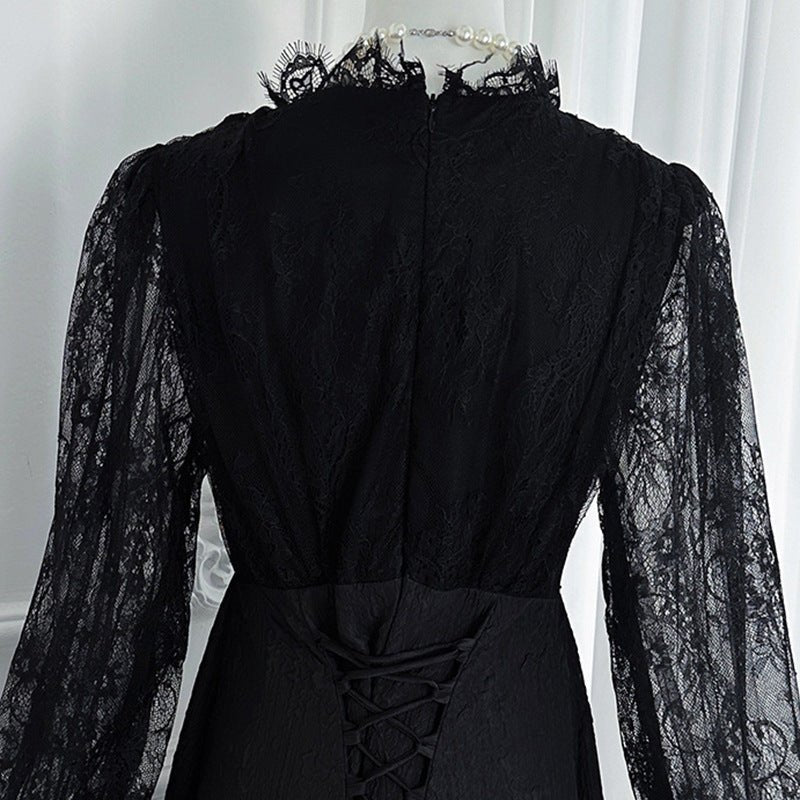 Back view of French lace maxi dress showing elegant draped silhouette