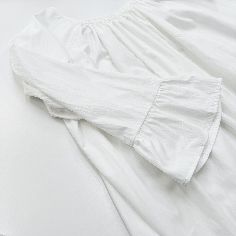 Floor-length A-line silhouette of white oversized loungewear abaya