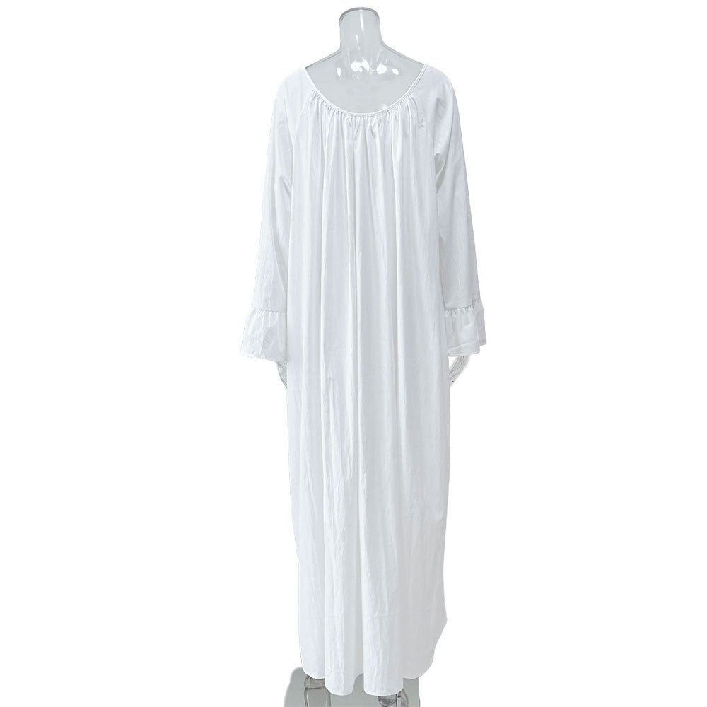 Close-up of delicate gathered ruffle cuffs on maxi dress sleeve
