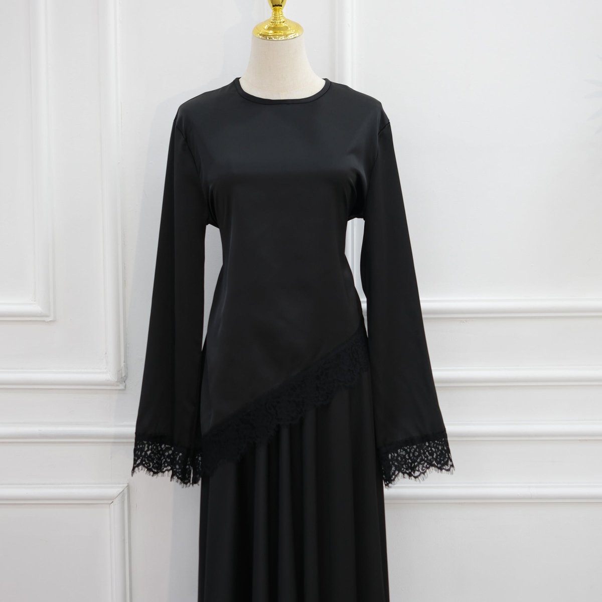 Round neckline detail of lace trim satin top