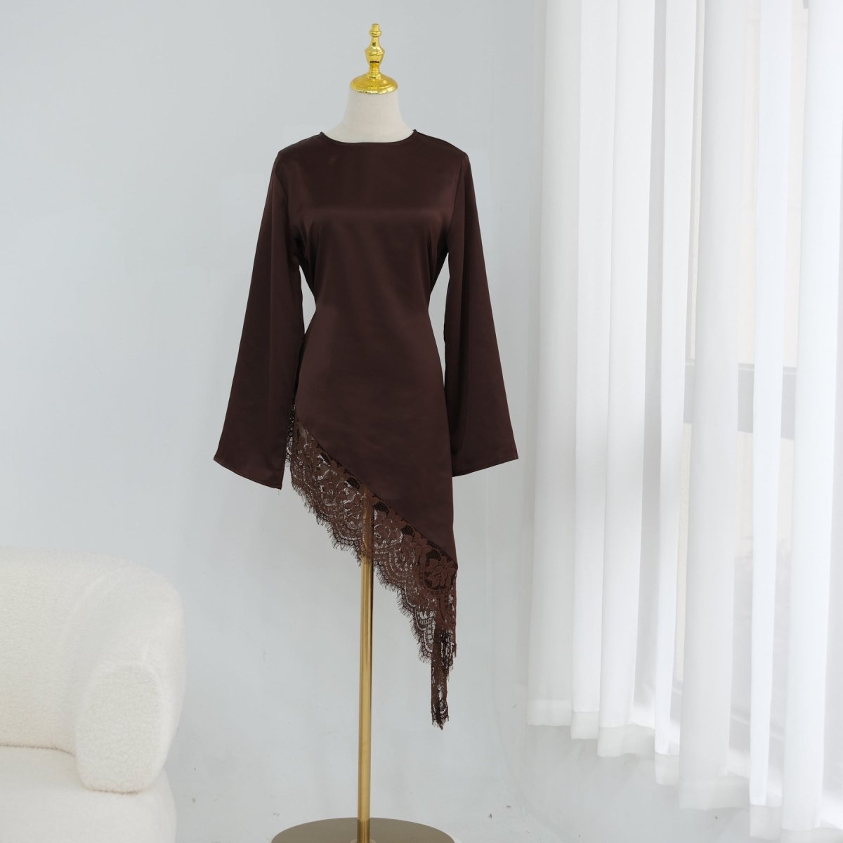 Round neckline and clean front panel of lace trim satin top