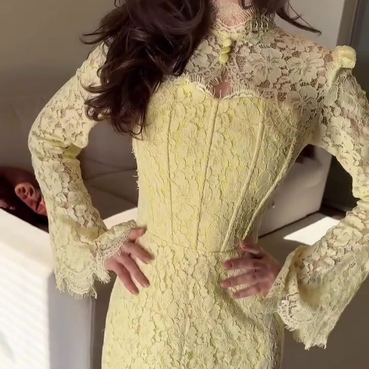 Sheer lace overlay and coordinating slip lining visible at hem