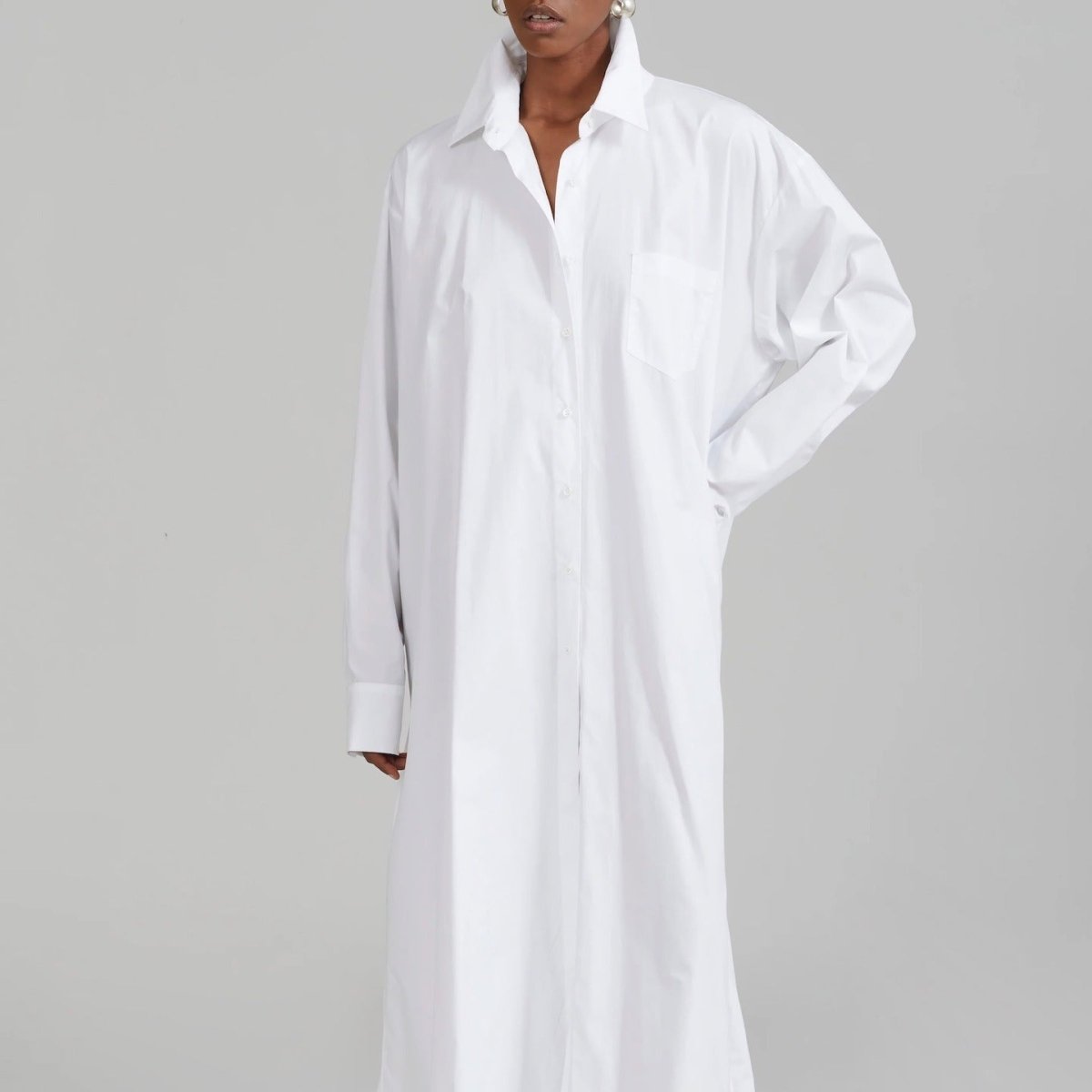 Casual modest shirt dress styled for summer outing