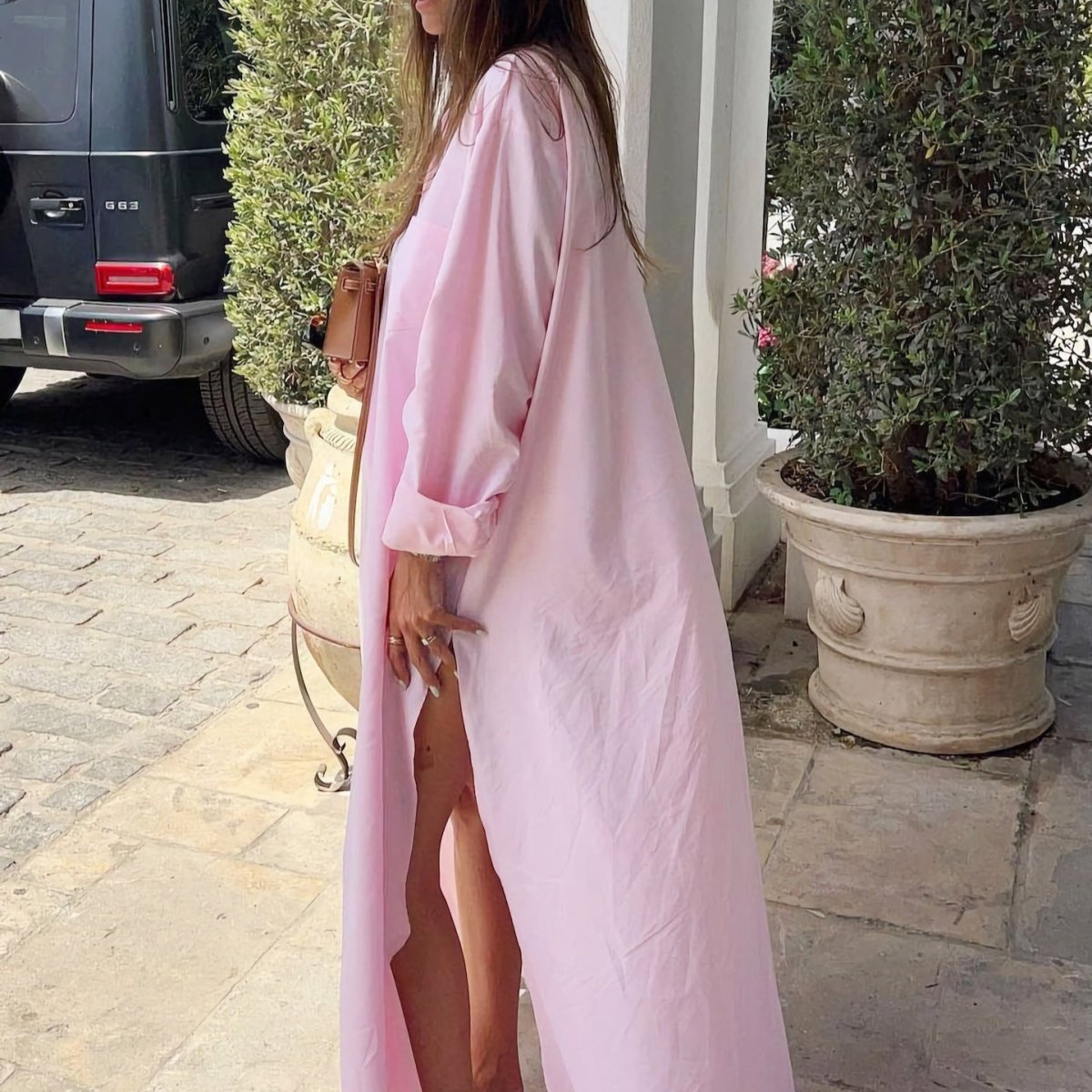 Three colour options of shirt dress abaya displayed