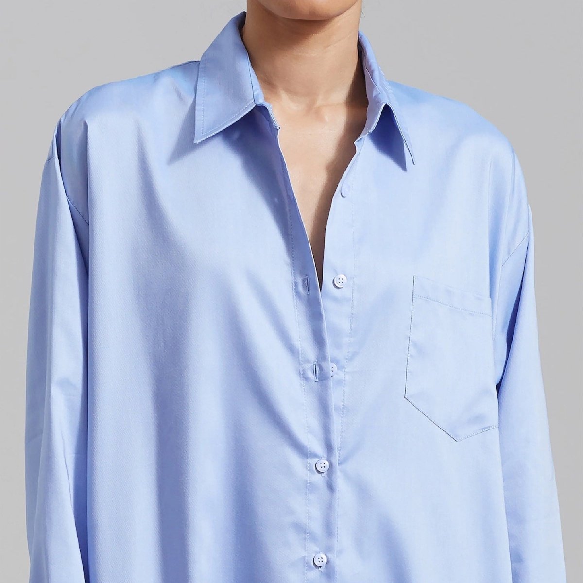 Shoulder and collar drape on oversized shirt dress