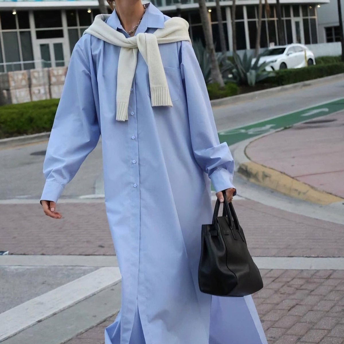 Periwinkle shirt abaya styled with sandals