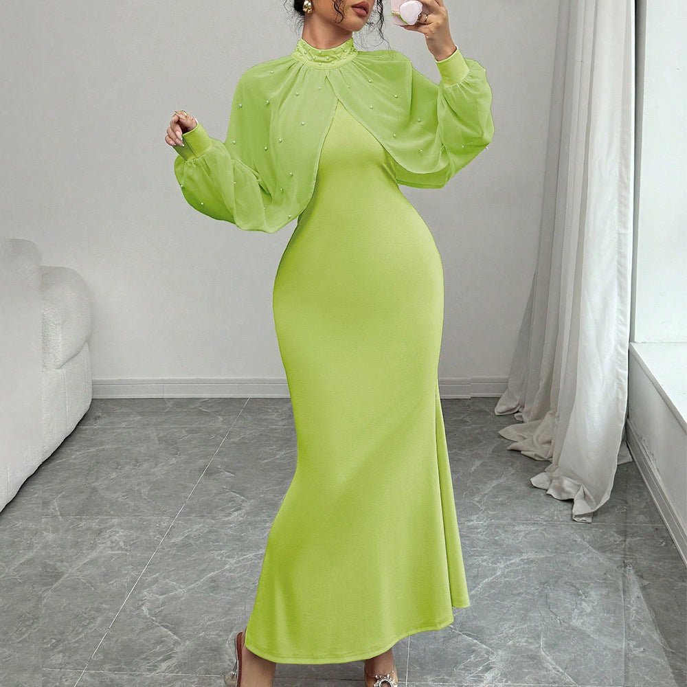 Elegant maxi dress styled for a wedding or gala occasion