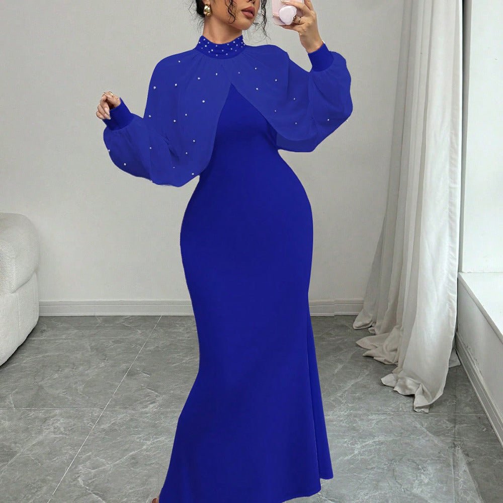 Back view showing keyhole nape opening and pearl-studded collar