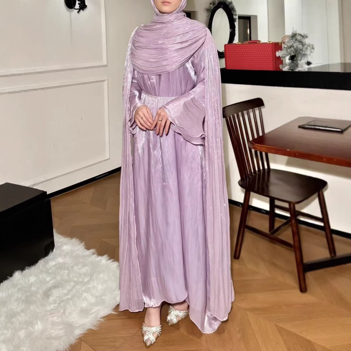 Front view of pleated cape sleeve abaya in jewel tone colourway