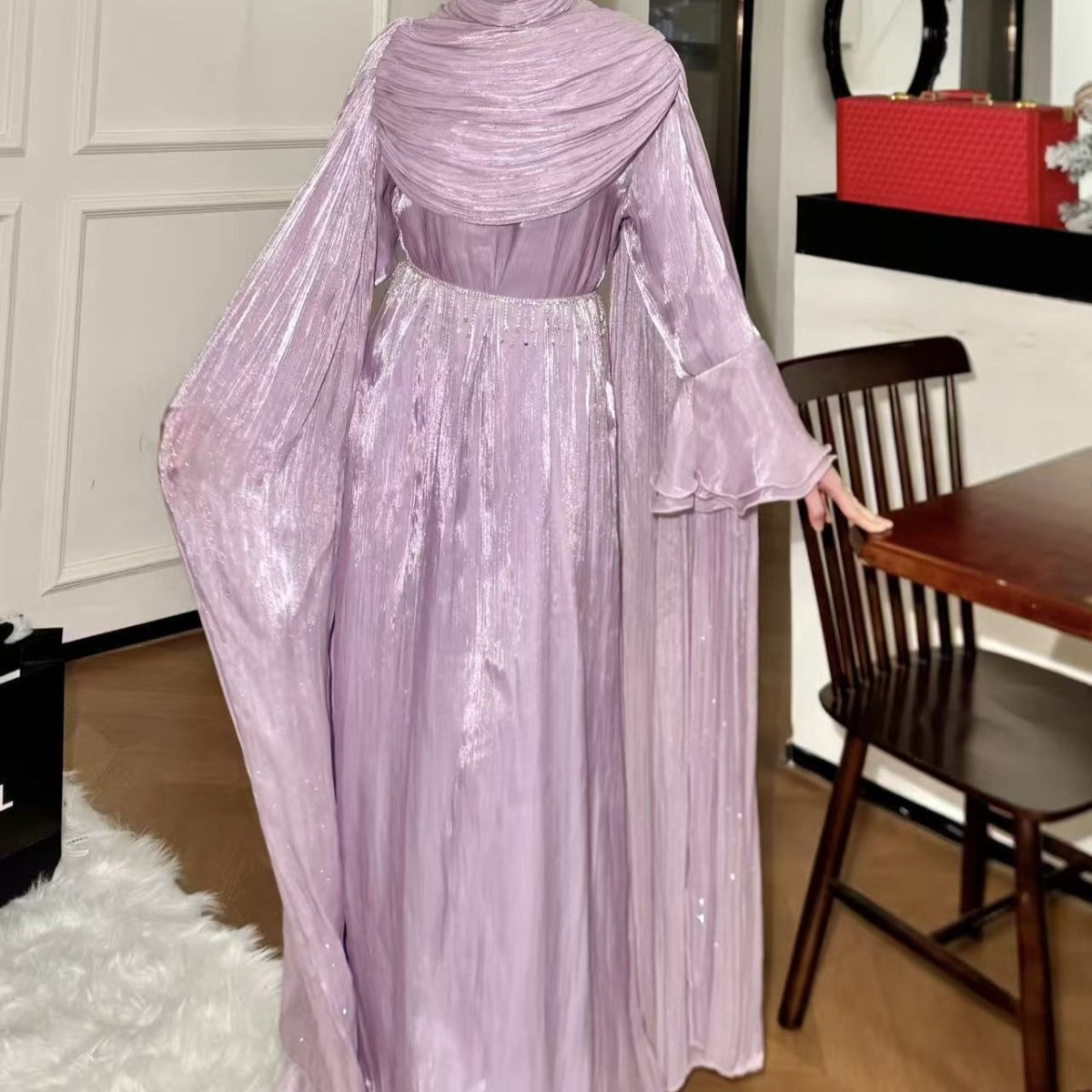 Soft luminous sheen of island silk on full-length abaya dress