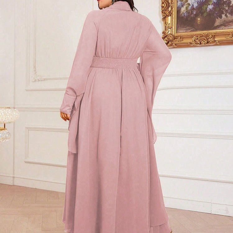 Double-tiered asymmetric ruffle hem detail on chiffon maxi dress