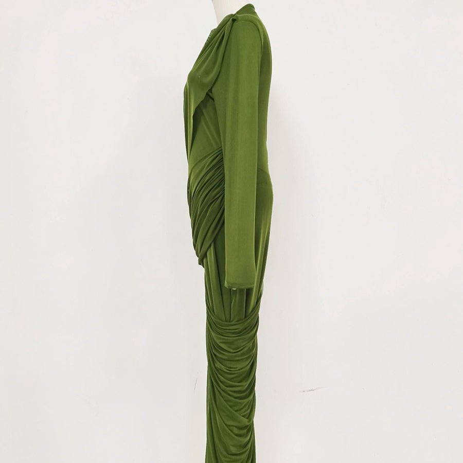 Close-up of asymmetric pleated panels and gathered bodice on stretch jersey maxi dress