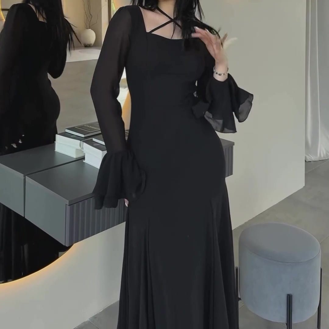 Black ruffle sleeve maxi dress with flowing A-line skirt