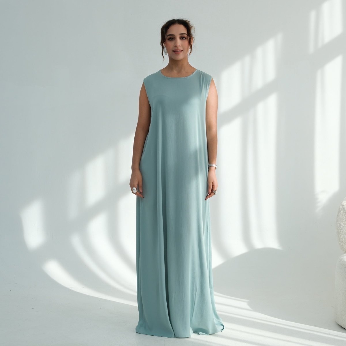 Wrinkle-resistant poly-cotton blend sleeveless maxi dress in neutral solid colour