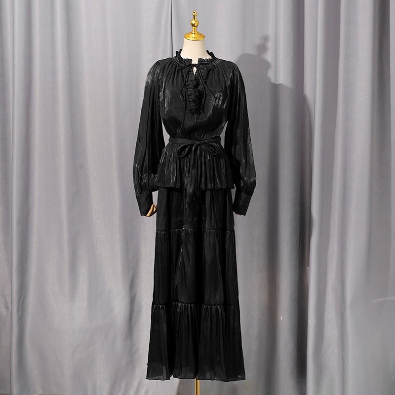 Full-length front view of tiered ruffle maxi dress in navy blue shimmer satin