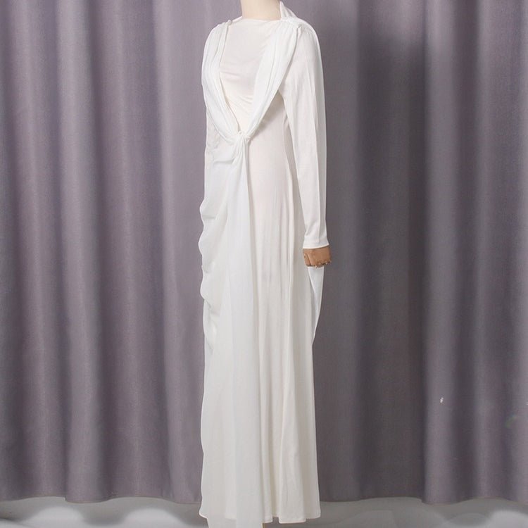 Side profile showing fitted waist and flowing chiffon overlay skirt