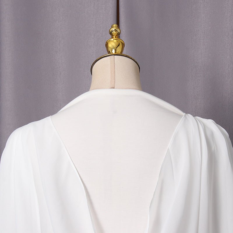 Long sleeve cuff and twisted bodice texture detail