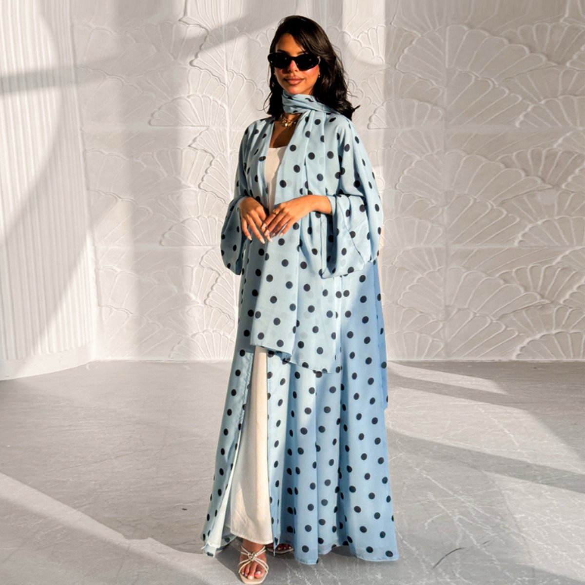 Coordinated hijab and abaya set in classic polka dot print