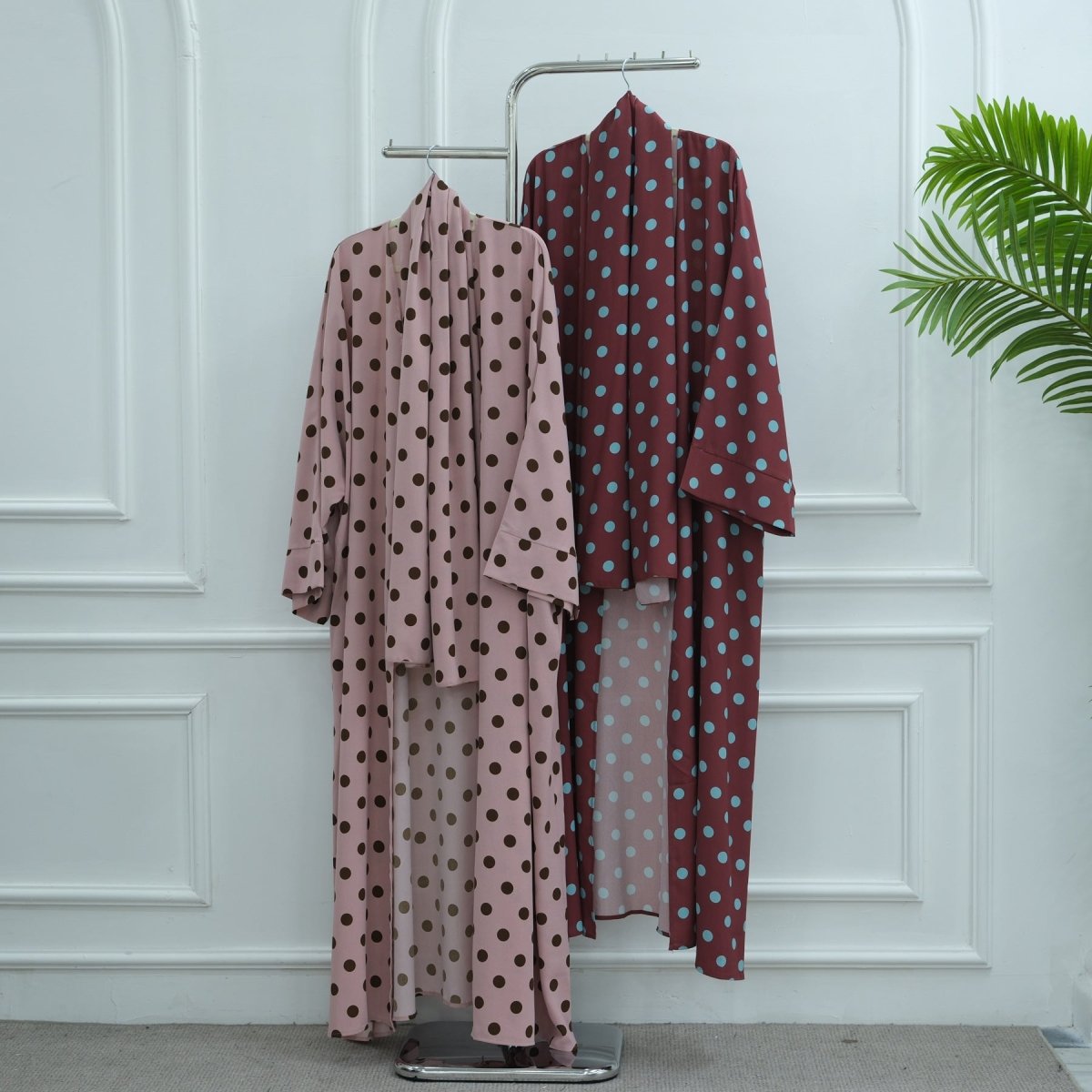 Shoulder and sleeve detail of batwing polka dot abaya cardigan
