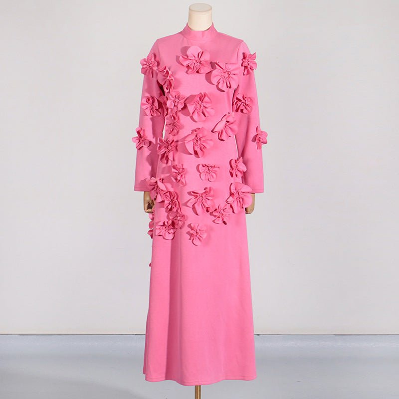 Front view of 3D floral appliqué maxi dress showing cascading bodice flowers