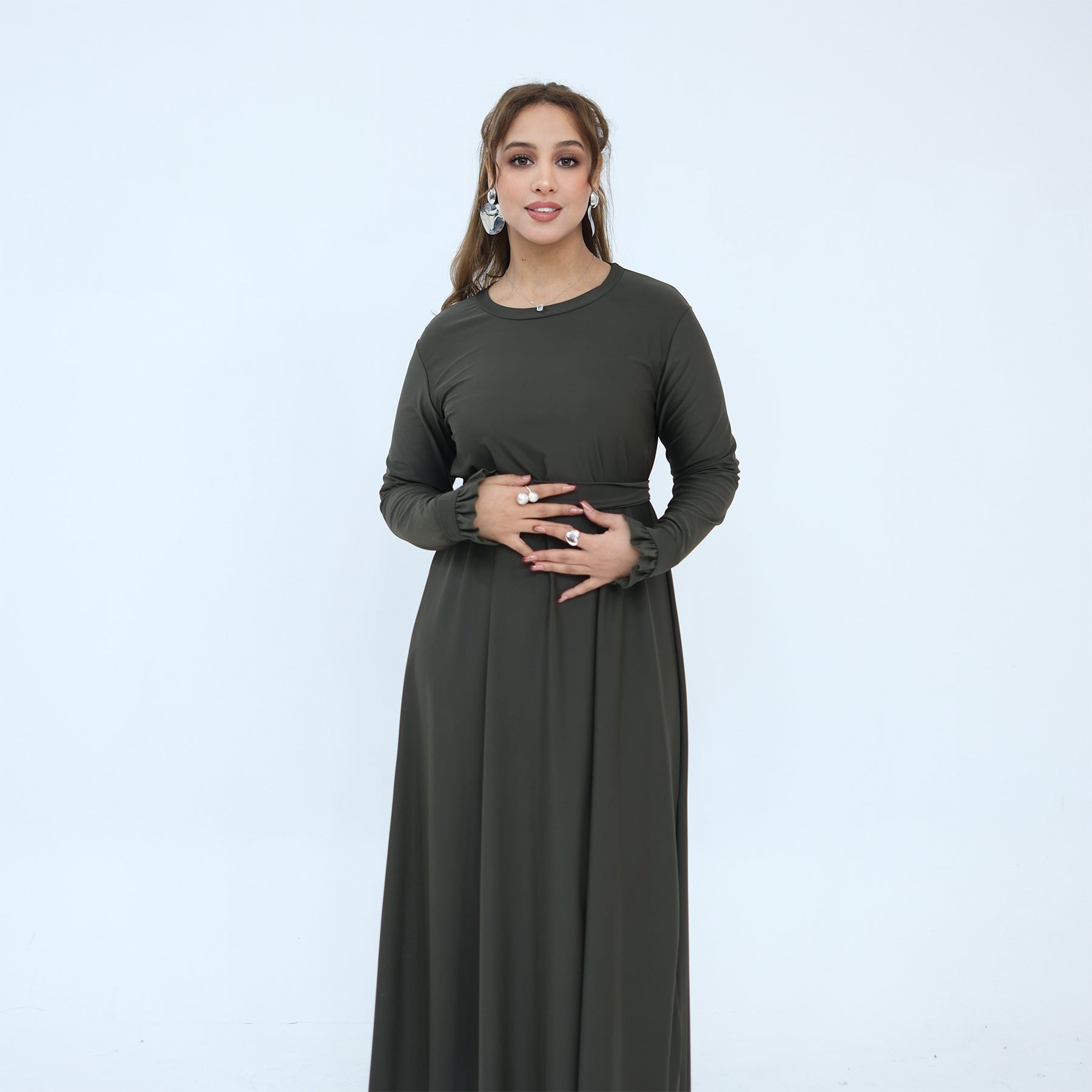 Modest swimwear set styled with waist belt for a structured silhouette