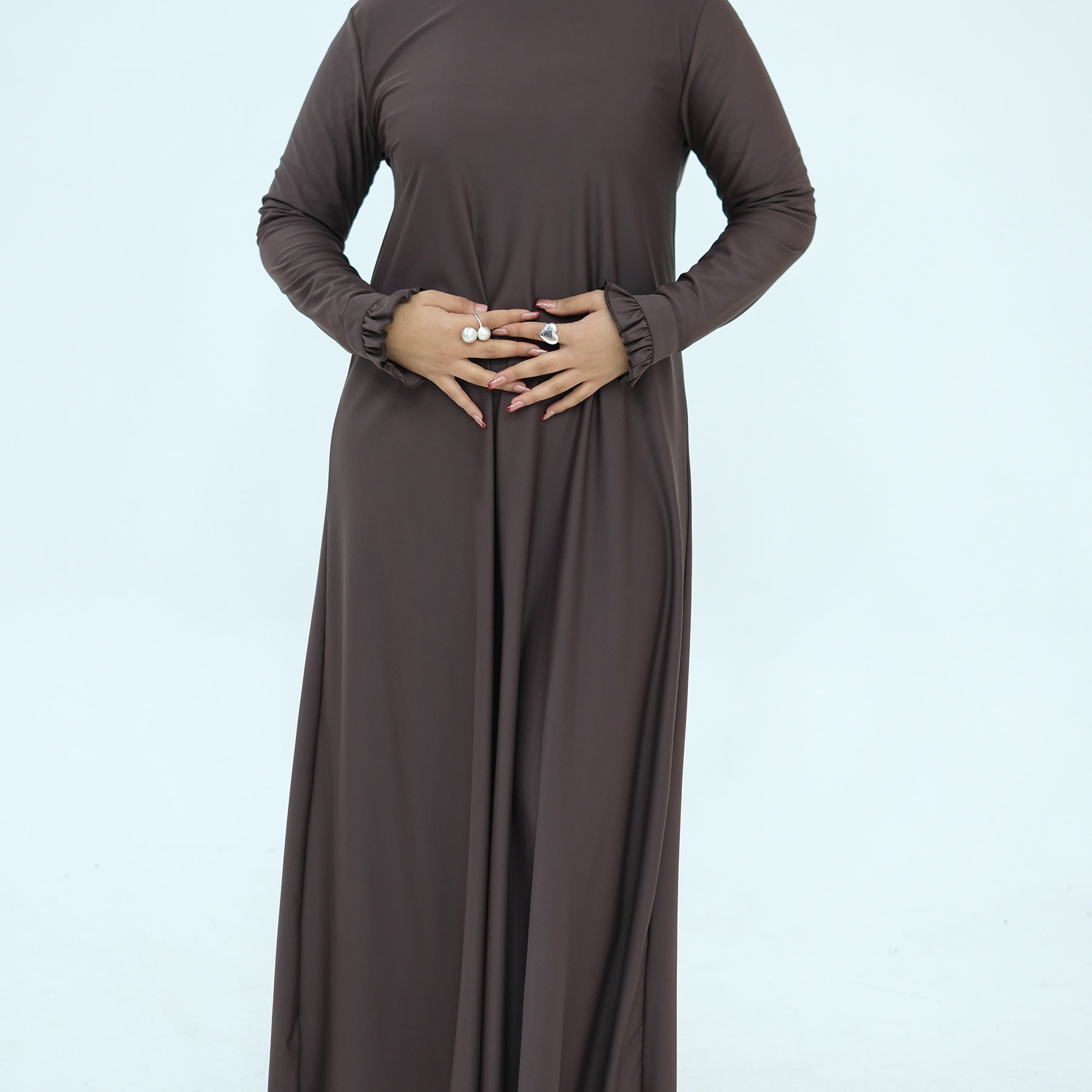 Side profile of modest swimsuit set showing A-line silhouette length
