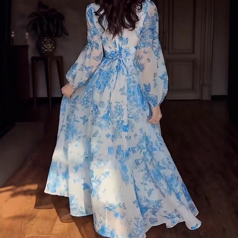 Modest gown with empire waist and romantic botanical print detail