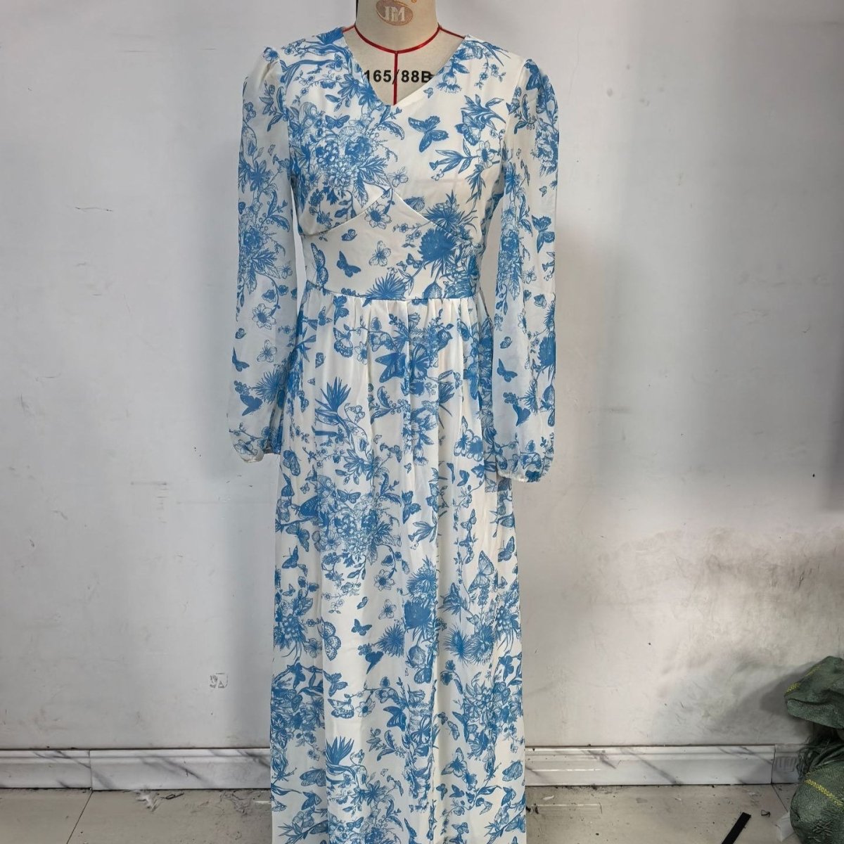 Blue floral maxi dress with romantic chinoiserie-inspired motifs
