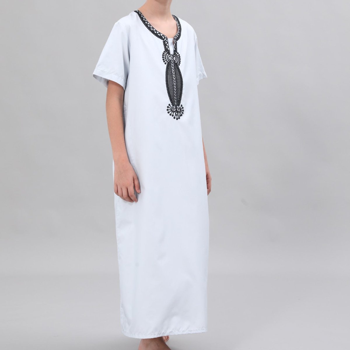 Back view of boys embroidered thobe in white poly-cotton
