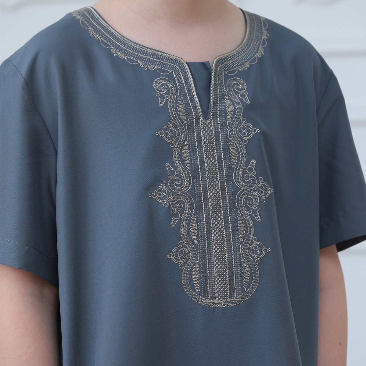 Short sleeve detail with tonal stitching on boys' embroidered thobe