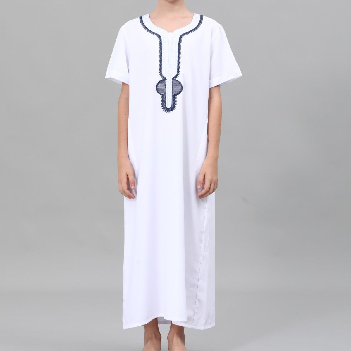 Boys' white thobe with navy contrast embroidery, full-length view