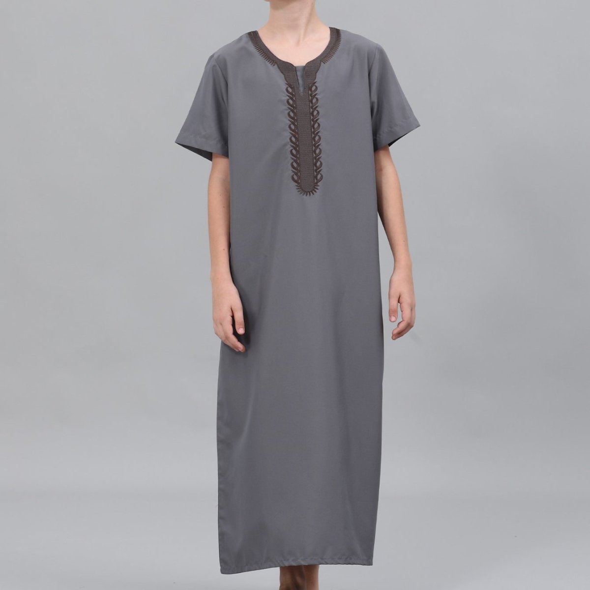 Boys' embroidered thobe in multiple styles laid flat for size reference