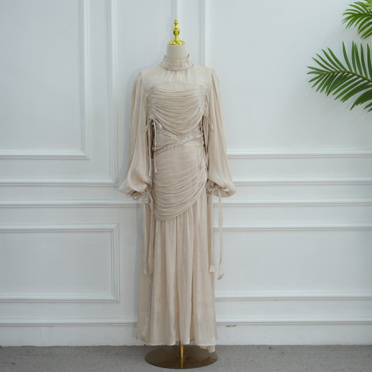 Front silhouette of luxury pleated maxi party dress