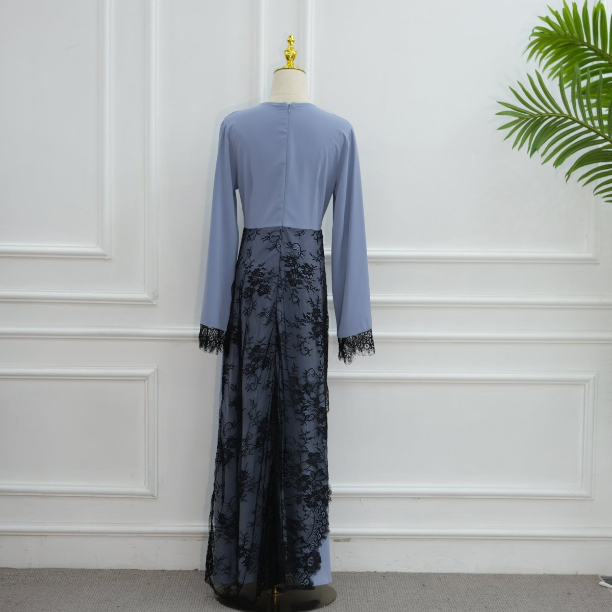 Close-up texture of bold floral black lace on waist band panel